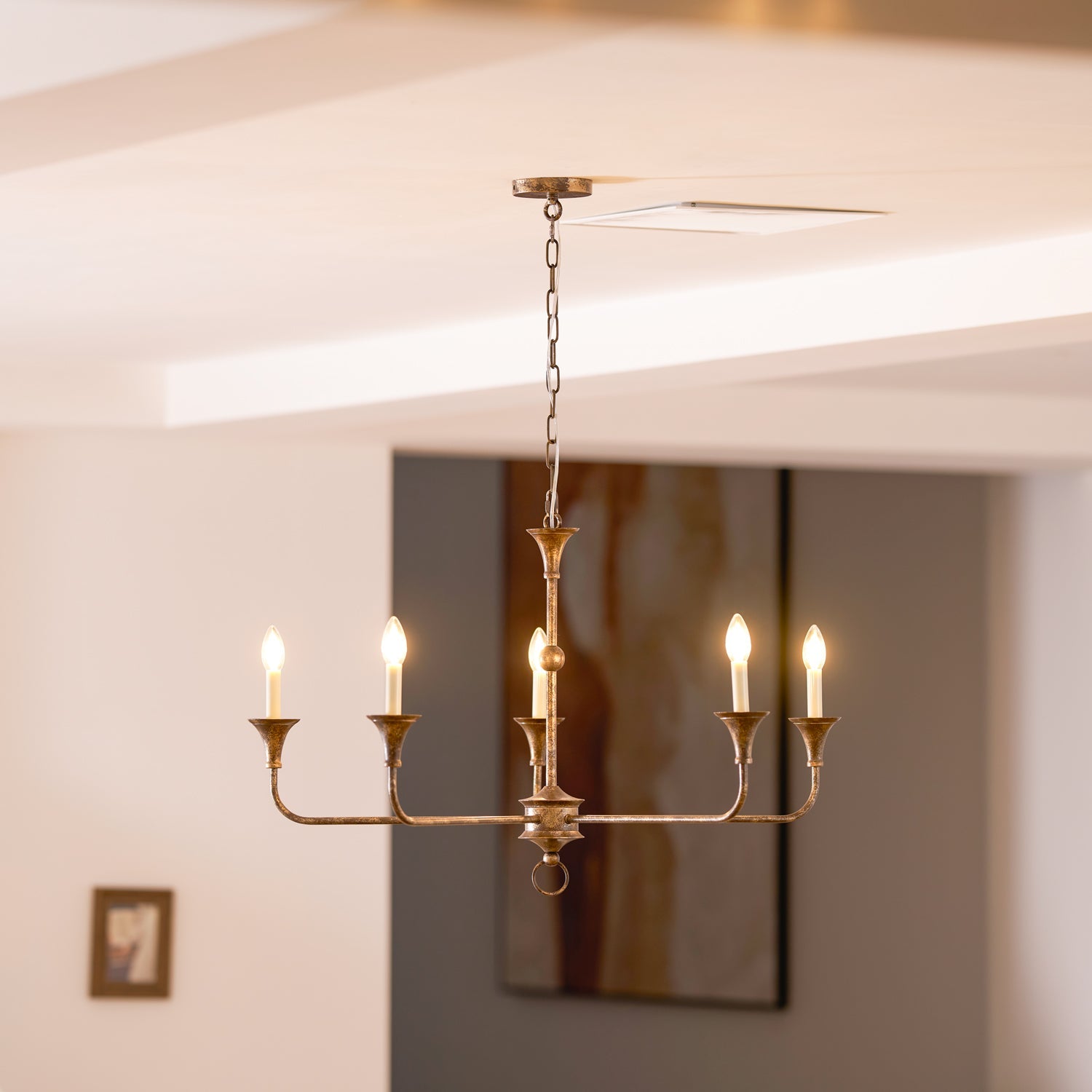 Candle chandelier arm and bulb fitting close-up