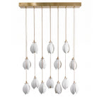 Brass and white ceramic flower pendant light in a bright room