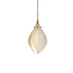 Ceramic flower pendant light cluster glowing with warm brass accents