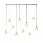 Ceramic flower pendant light with lit blooms and brass canopy
