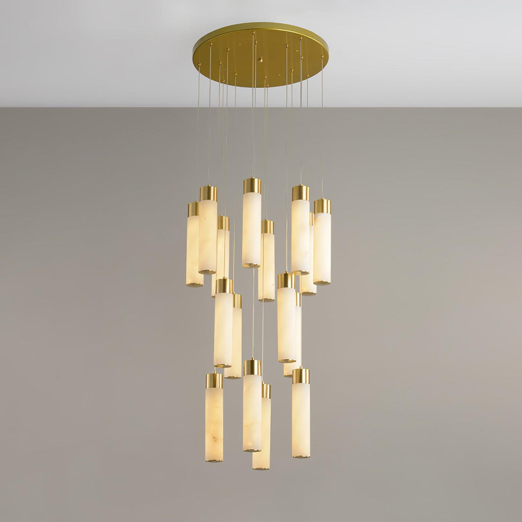 Dense Aurelia cluster viewed from slightly below, brass caps catching light above each stone tube.