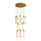 Aurelia chandelier cut out on white, the alabaster tubes lit to show their warm translucency.