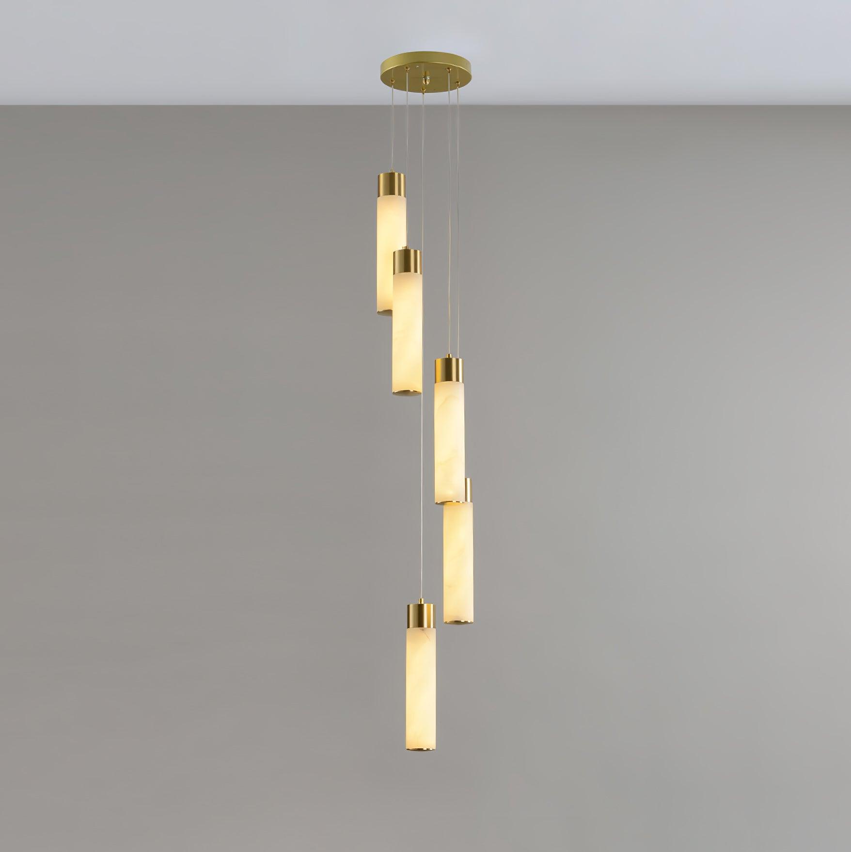 Compact five-light Aurelia with a long stagger, each alabaster tube capped in polished brass.