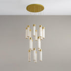 The Aurelia chandelier switched off, showing the cool white veining of the unlit alabaster tubes.