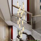 Lit in a marble stairwell with red drapes, the rods dropping the full height of the space.