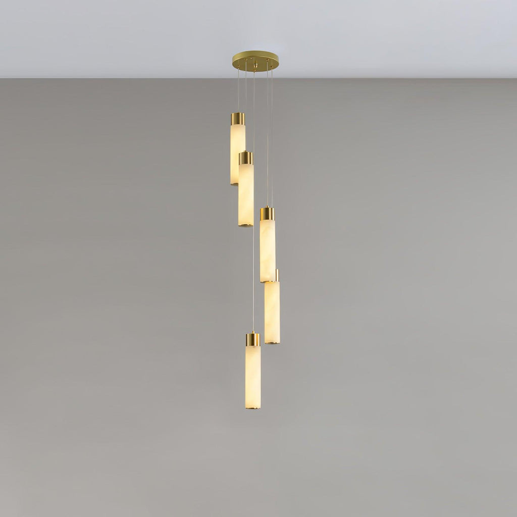 Five alabaster rods with brass collars hung in a loose spiral from a round ceiling plate.