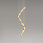The full-height version, its rods winding down in a tall unbroken spiral against grey.