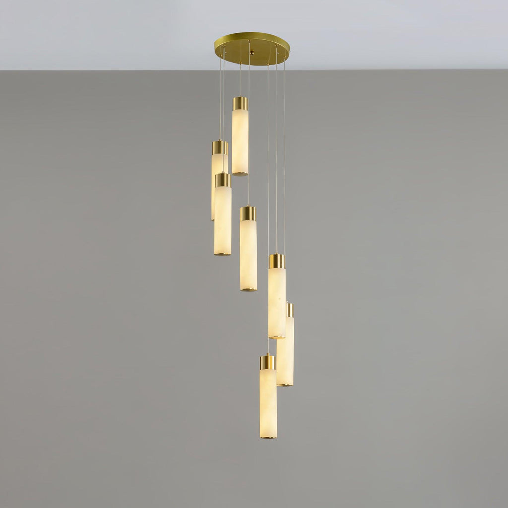 Eight alabaster tubes in a tight spiral, showing how the drops overlap when viewed from the side.
