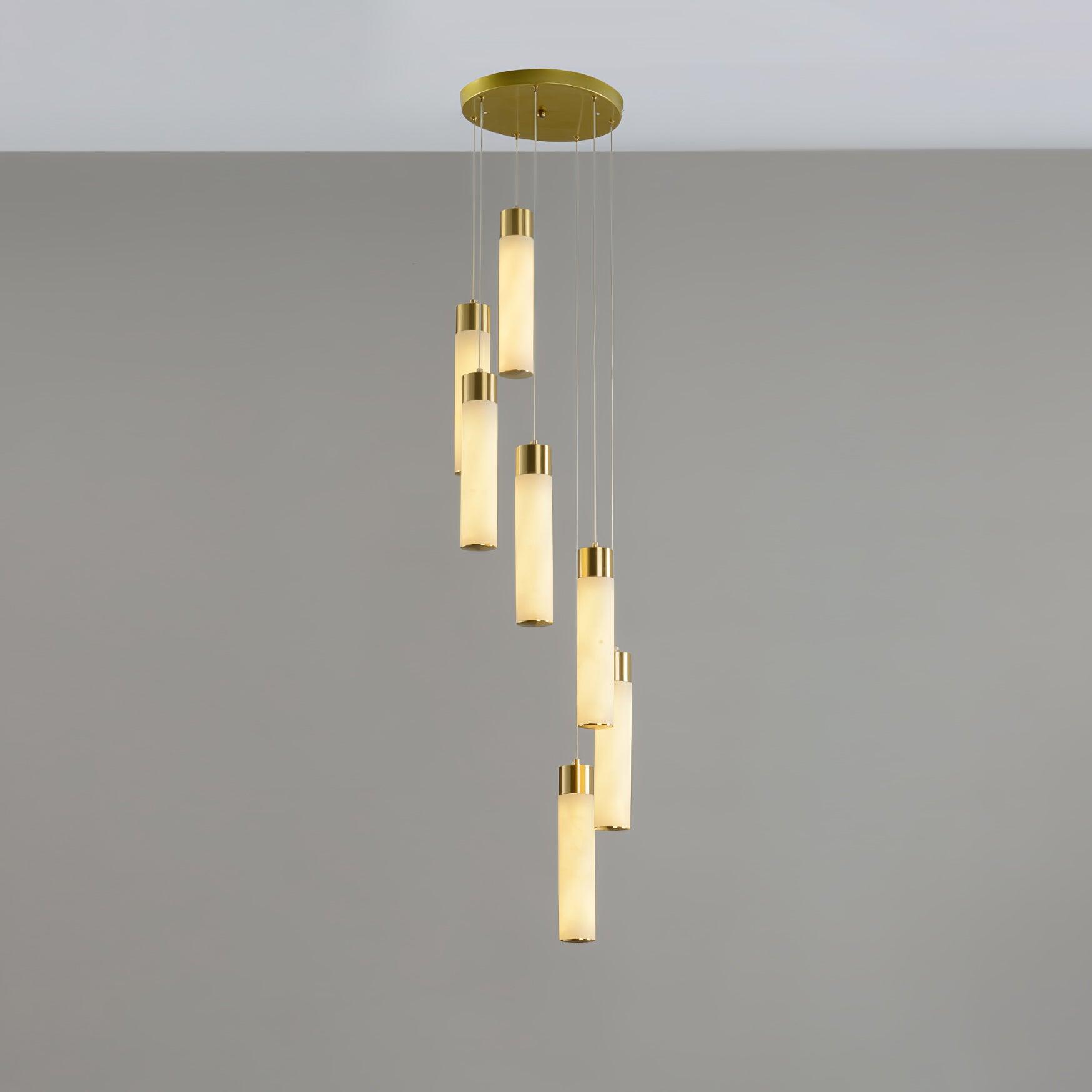 Eight alabaster tubes in a tight spiral, showing how the drops overlap when viewed from the side.