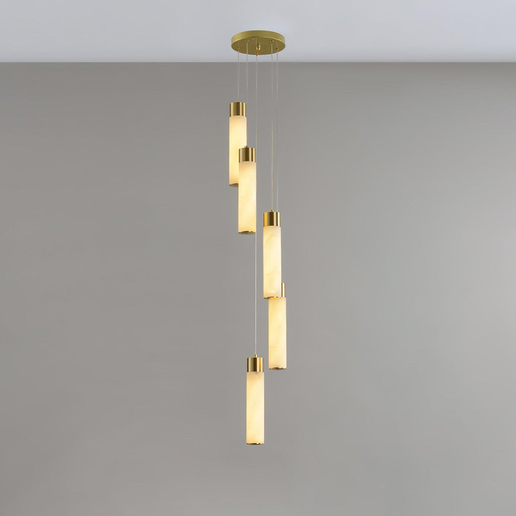 Five rods hung in a shallow spiral on grey, the simplest of the configurations.