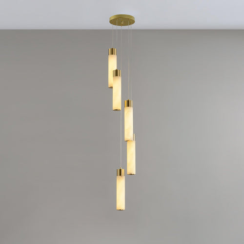 Five rods hung in a shallow spiral on grey, the simplest of the configurations.