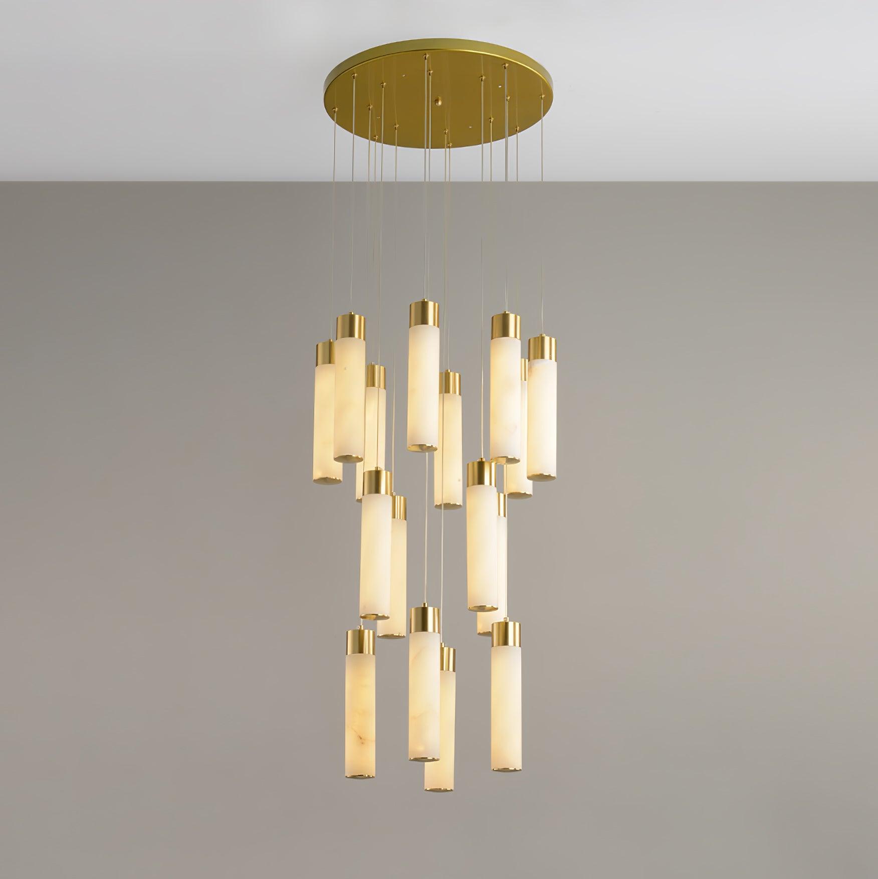 A fifteen-rod cluster on grey, the tubes lit so their alabaster grain shows.