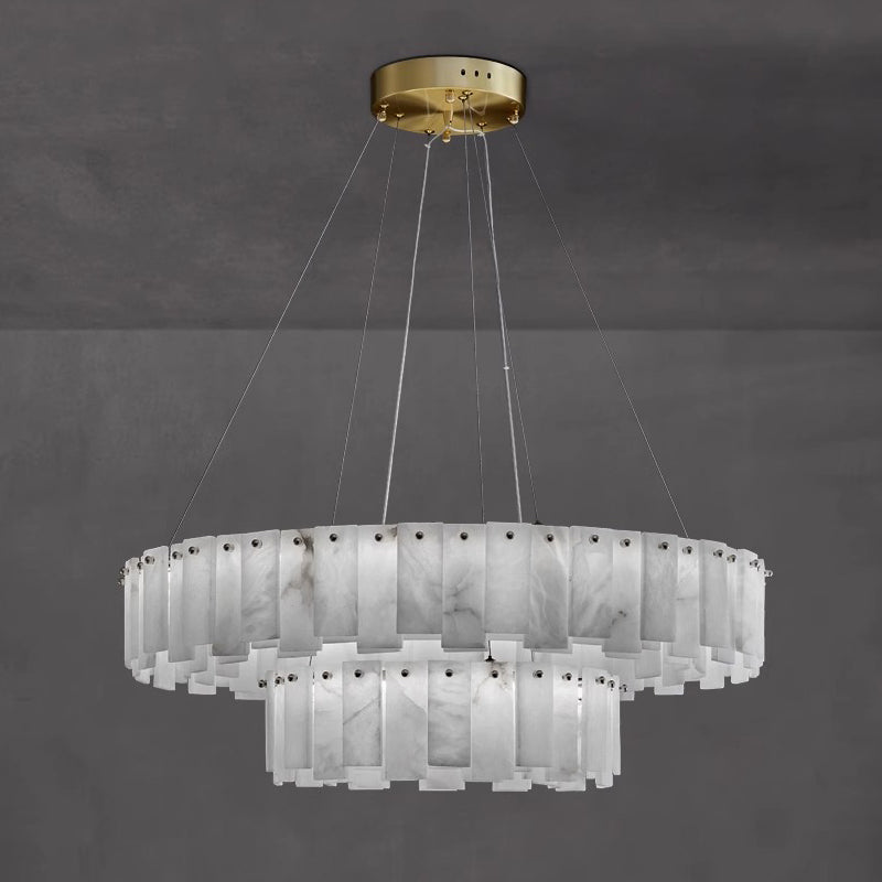 Aero round chandelier on a plain grey background, cool grey-veined alabaster panels held by metal studs