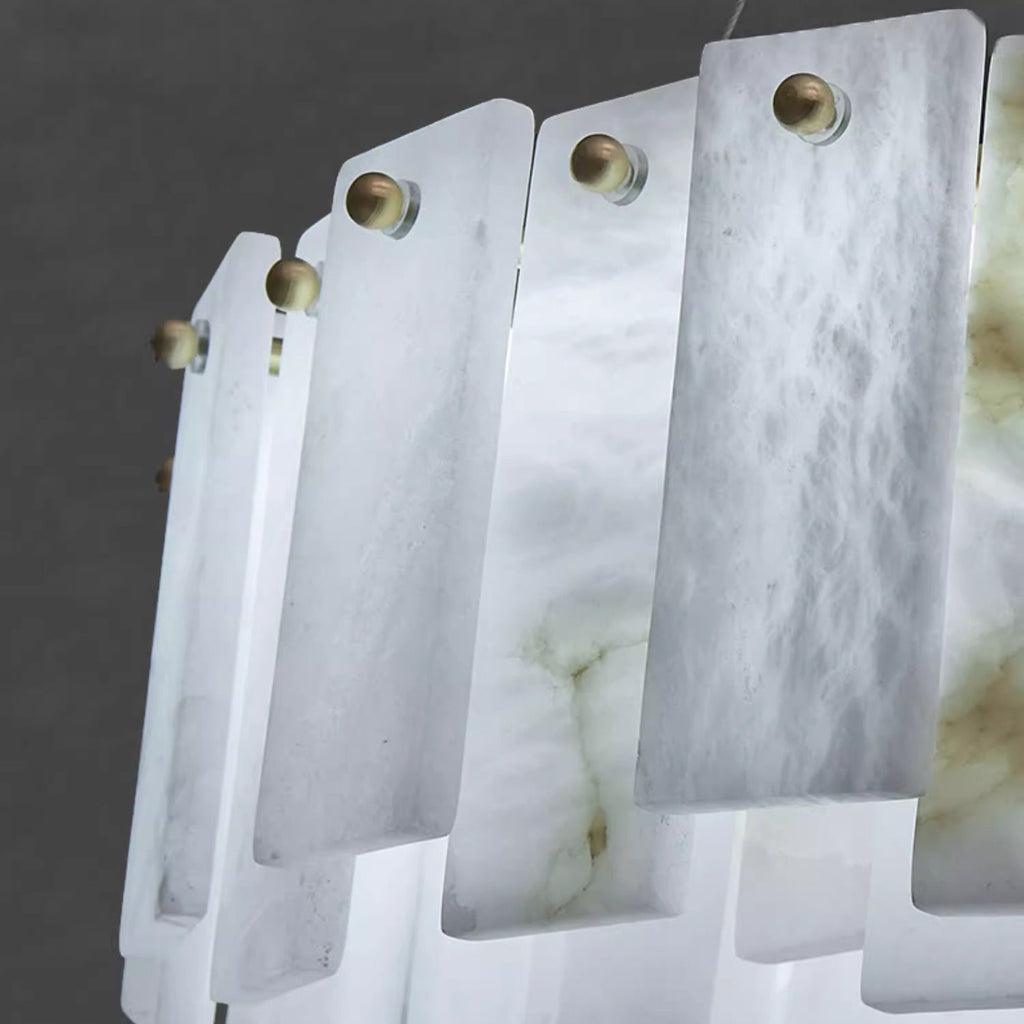 Angled close-up of the Aero chandelier's layered alabaster panels stepping over one another