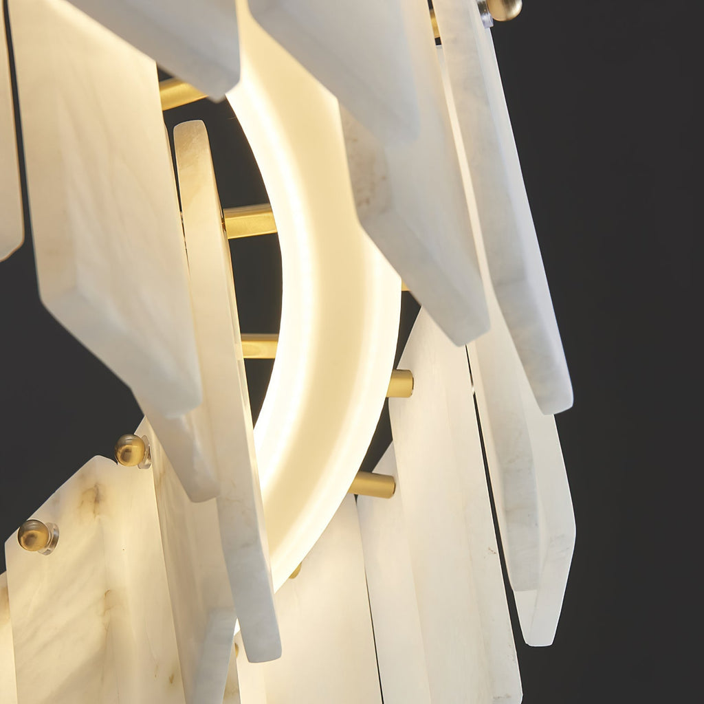 Close view inside the Aero chandelier, curved lit diffuser and brass rods behind the alabaster panels