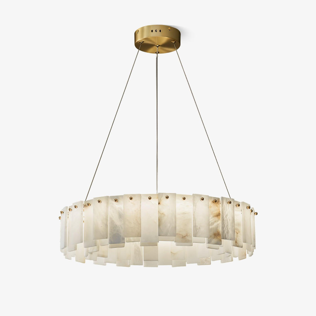 The drum chandelier on pale grey, hung on fine cables from a round brass ceiling plate.
