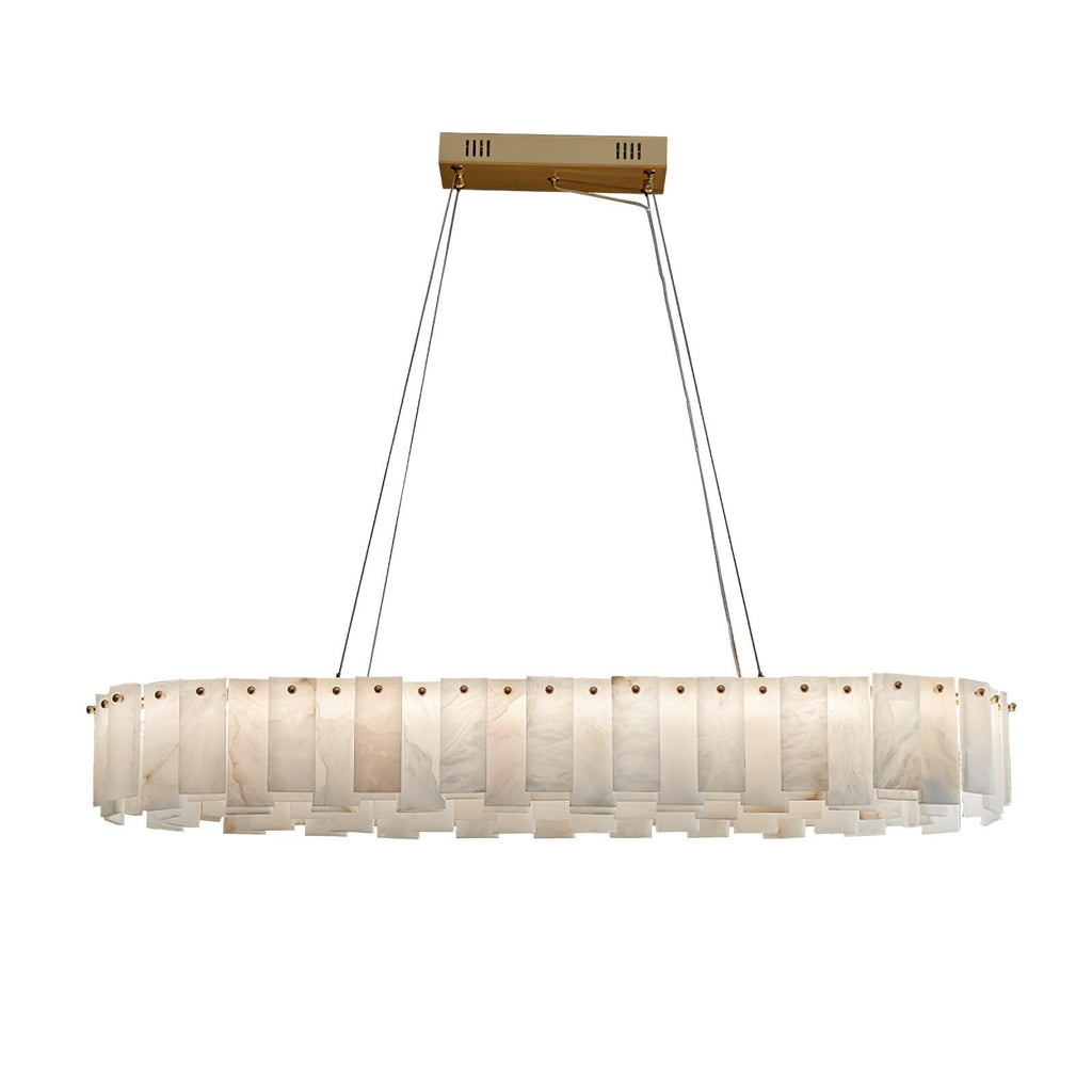 The long racetrack version on white, alabaster tiles running the full length of a brass bar.
