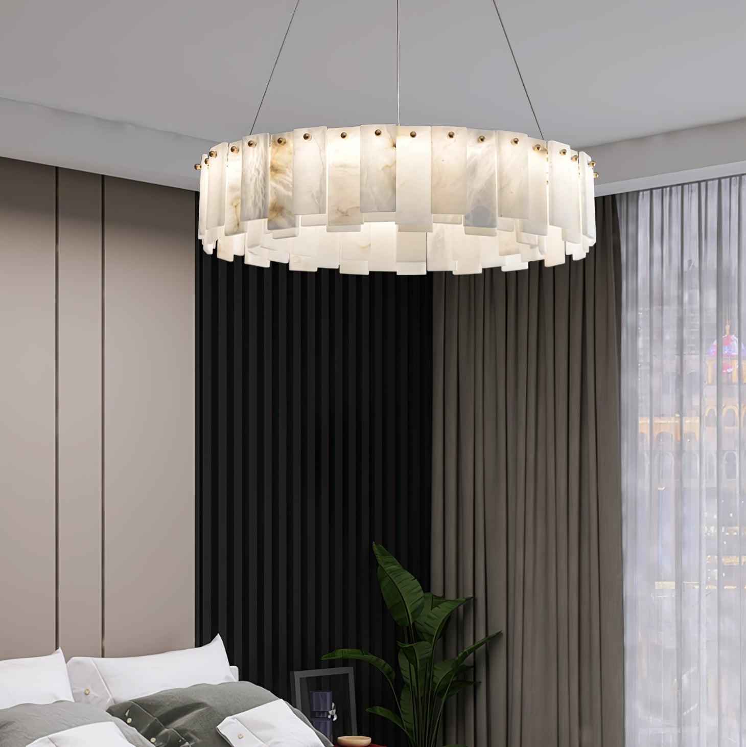 Lit in a bedroom beside heavy dark curtains and a tall potted plant.
