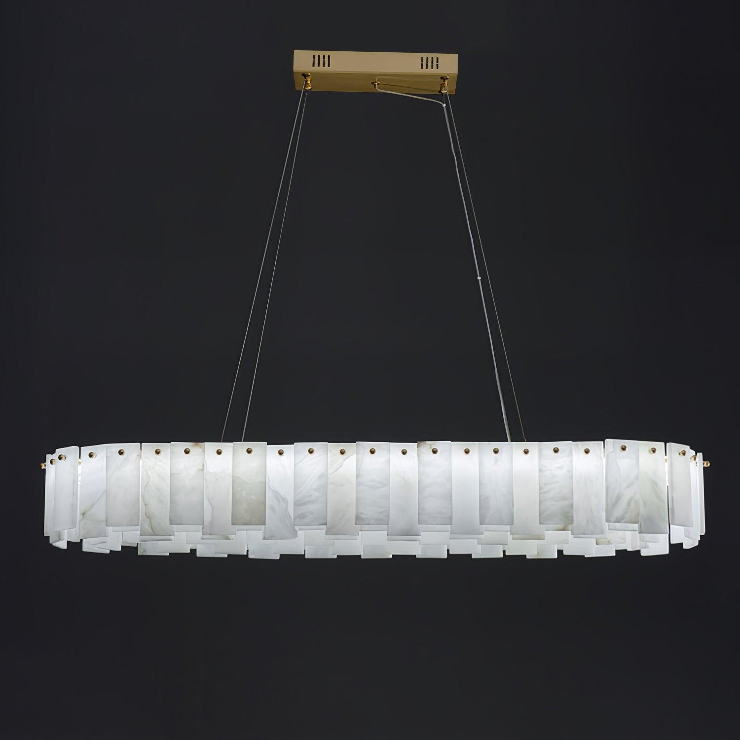 The long version against black, its stepped alabaster rim lit from within along the whole run.