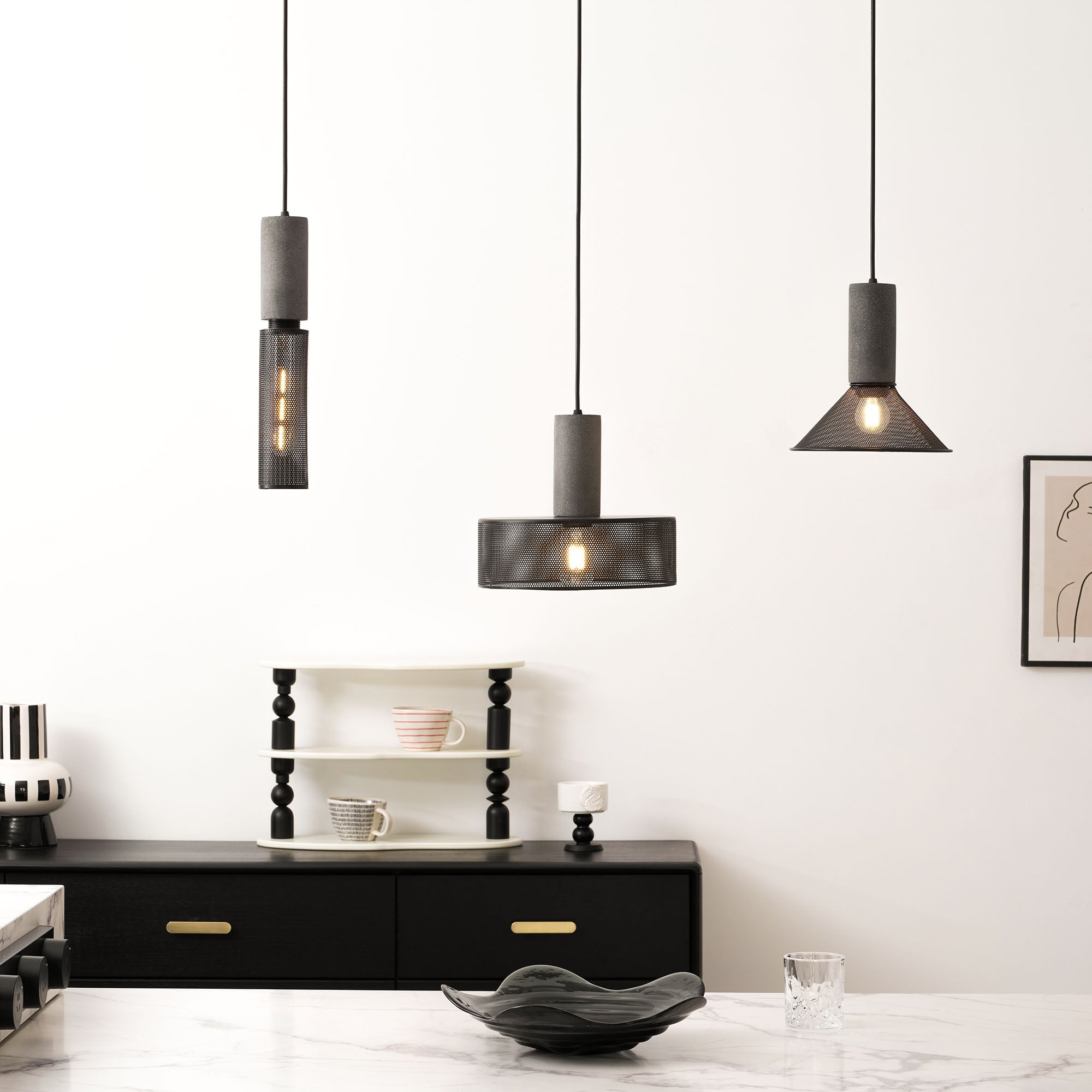 Slim cylinder cement mesh pendant light shown on its own