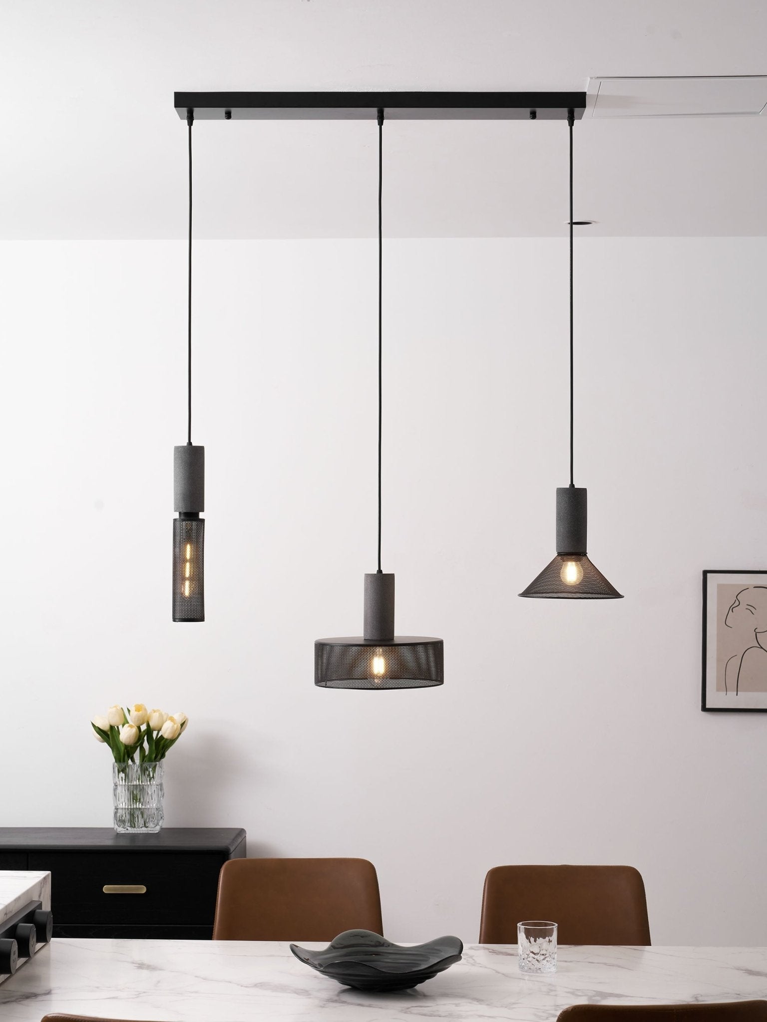 Wide dome cement mesh pendant light shown from the side