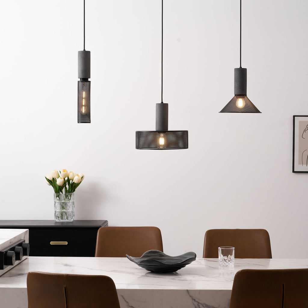 Tapered cement mesh pendant light against a plain background