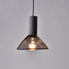 Black wire cage pendant light with raw cement top close up