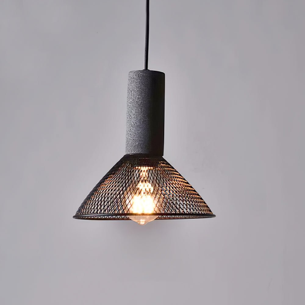 Black wire cage pendant light with raw cement top close up