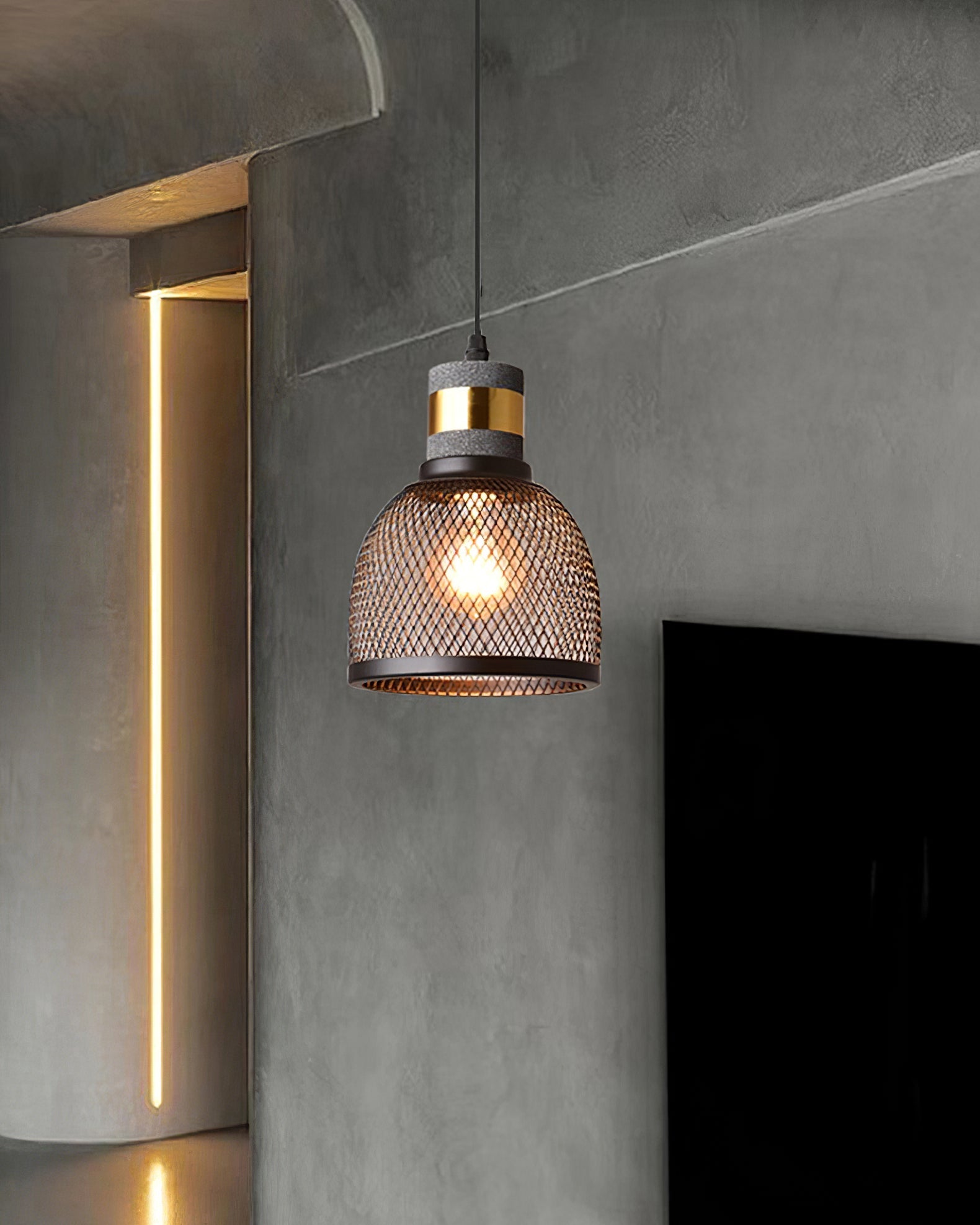 Industrial cement mesh pendant light hanging in a cafe