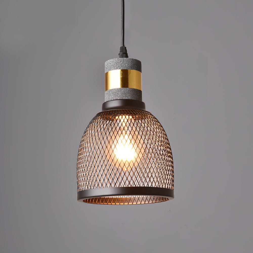 Industrial cement pendant light with bare filament bulb lit
