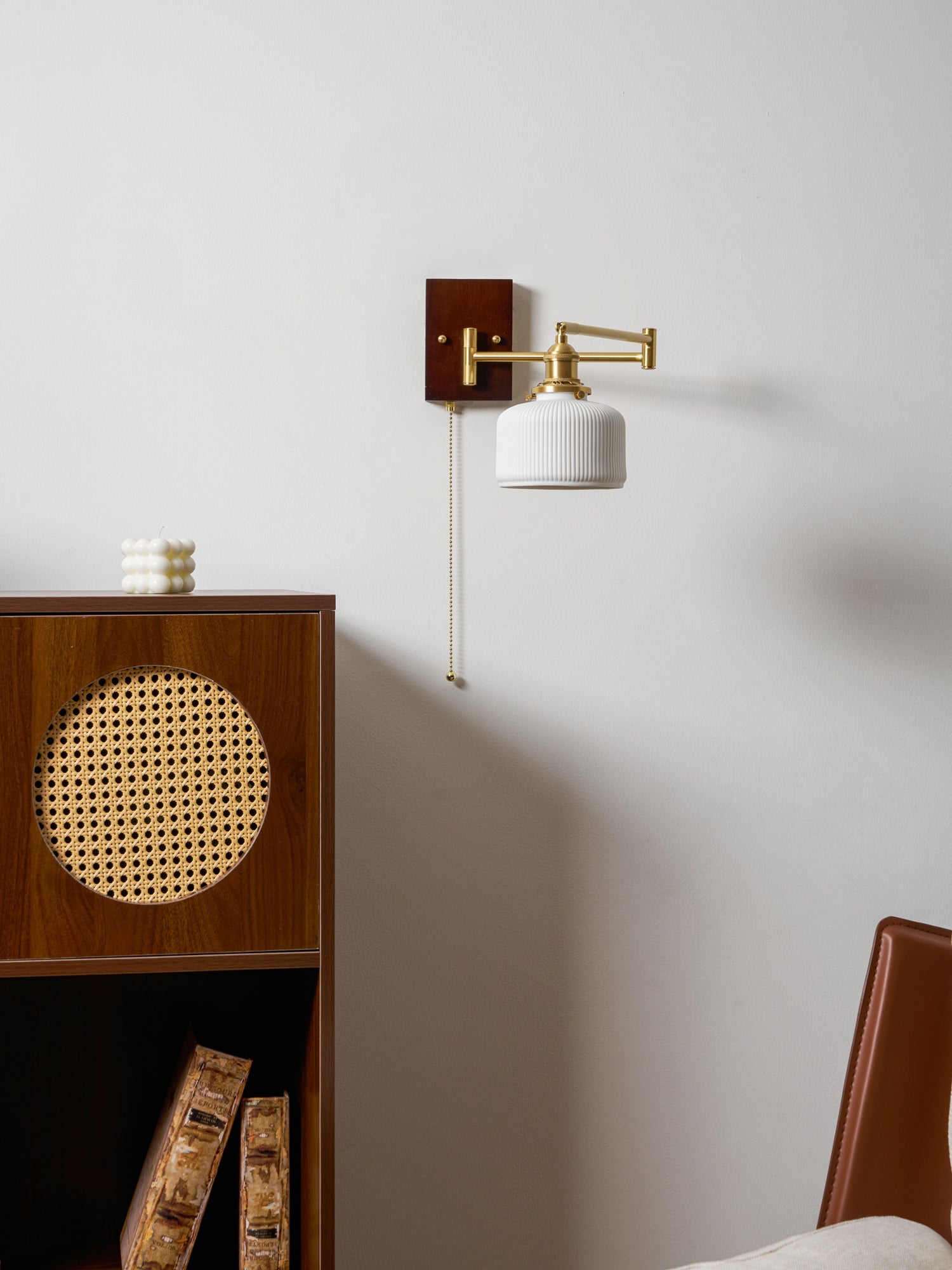 Ceramic wall lamp with walnut accent and white shade close detail