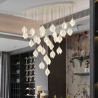 White ceramic bloom pendant light edited view with brass accents