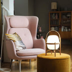 Wood and glass table lamp with soft warm illumination