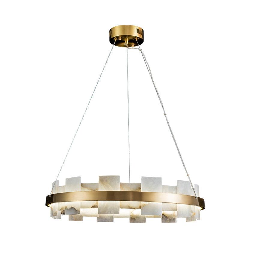 Brass ring chandelier on white, alabaster tiles set upright around the rim, seen at an angle.