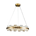 Brass ring chandelier on white, alabaster tiles set upright around the rim, seen at an angle.