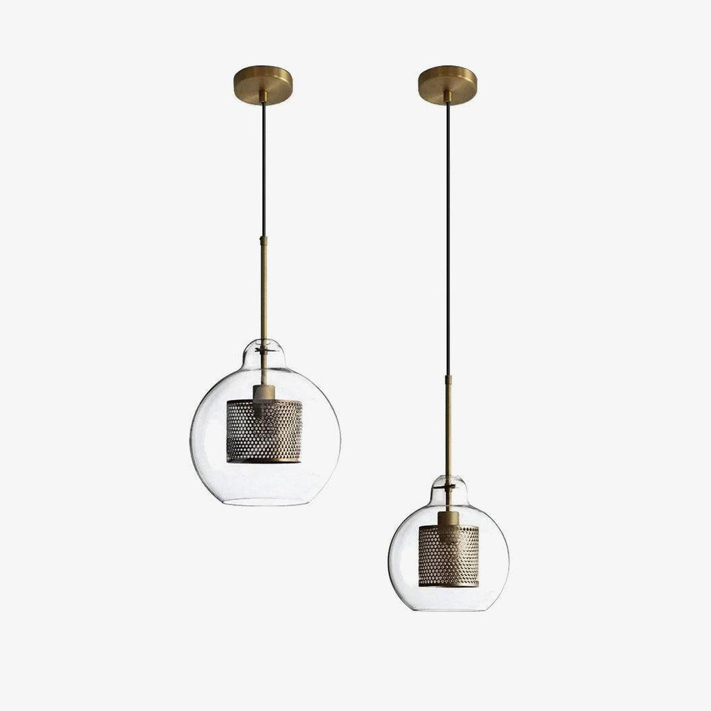 Cluster of glass pendant lights glowing warmly in an interior