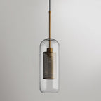 Capsule glass pendant light in copper finish with clear glass shade