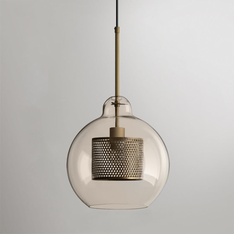 Blown glass pendant light glowing gently in a modern interior
