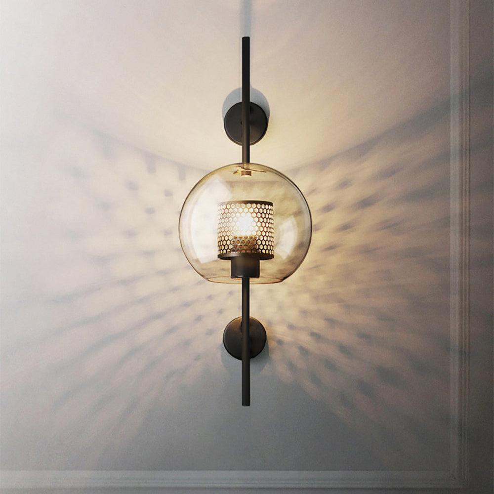 Glass wall light with warm glow mounted in a refined interior