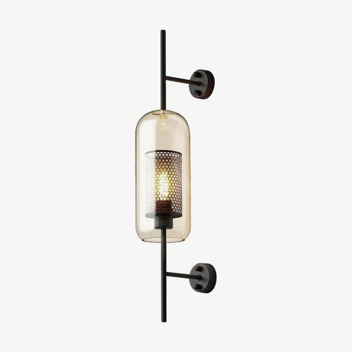 Glass globe wall light glowing softly beside an interior wall