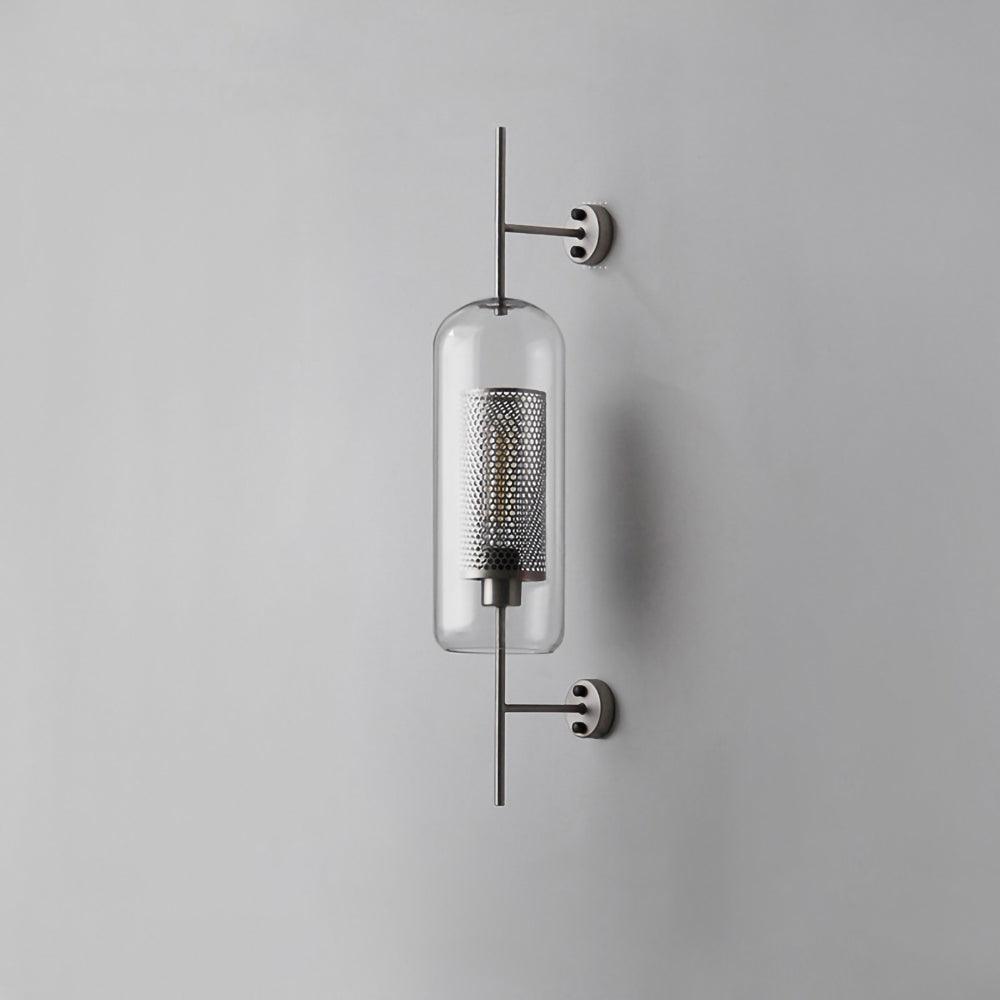 Capsule glass wall light in silver, larger size, with clear shade