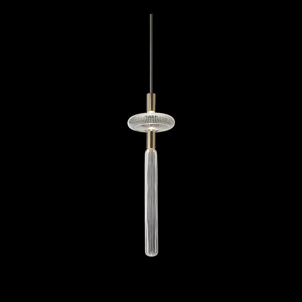 A round disc cap sits above this Clérachic pendant's fluted glass cylinder, against black.