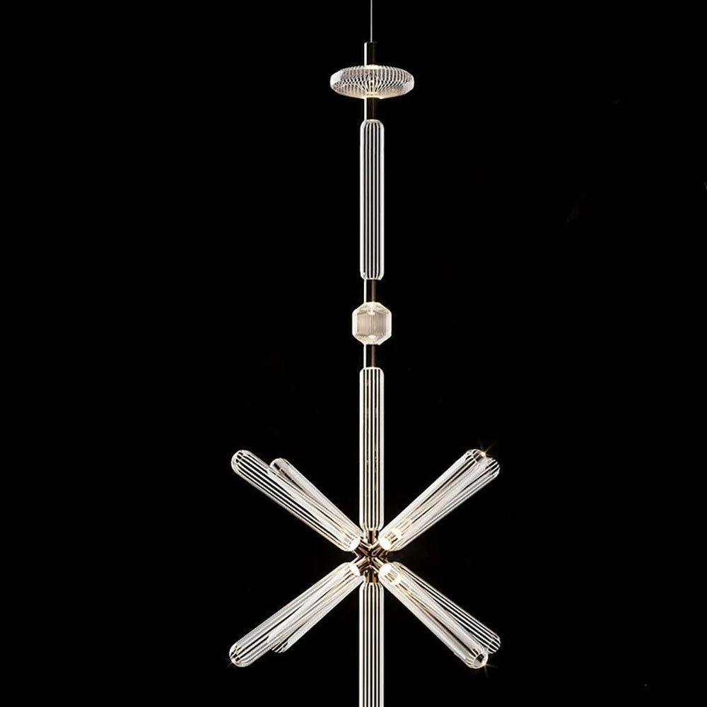 Below a fluted rod, this Clérachic pendant's crystal arms burst outward against black.