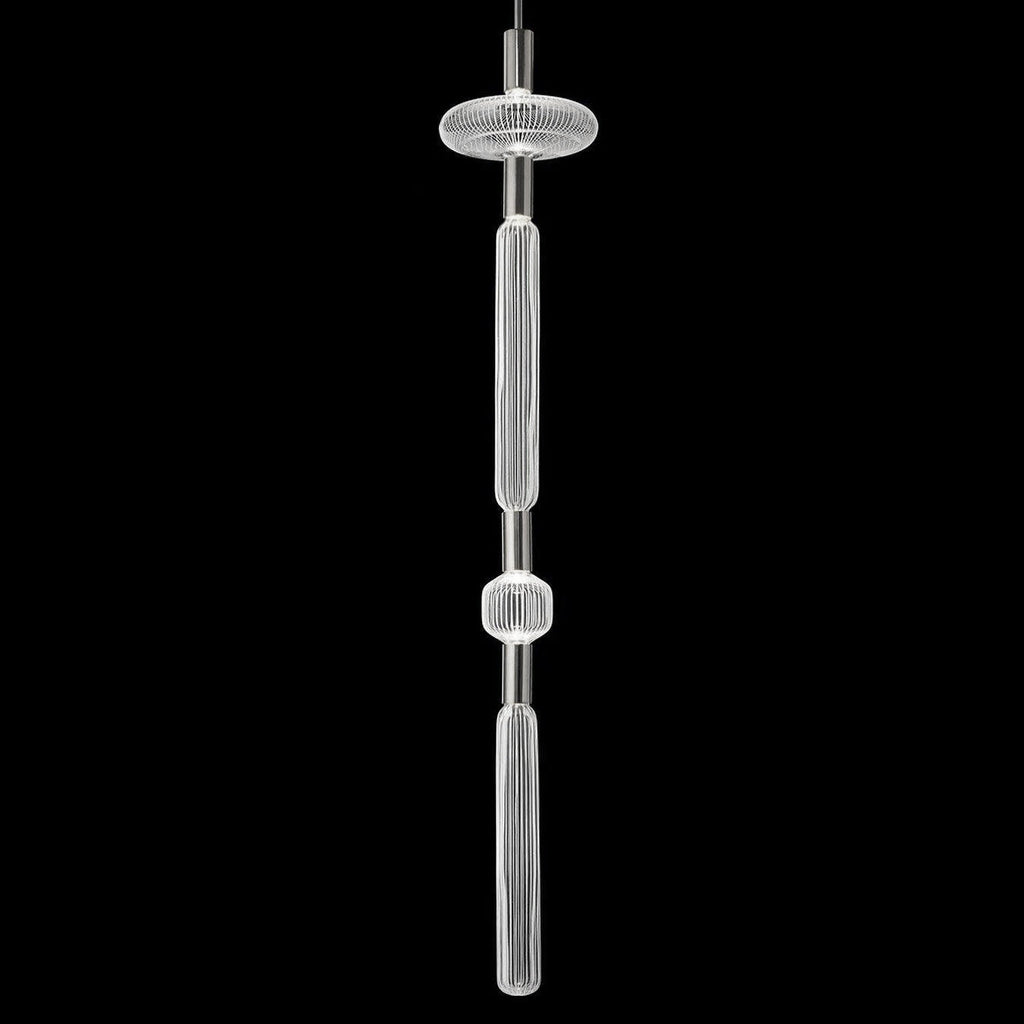 This Clérachic pendant's fluted cylinder hangs below a round disc cap, lit against black.