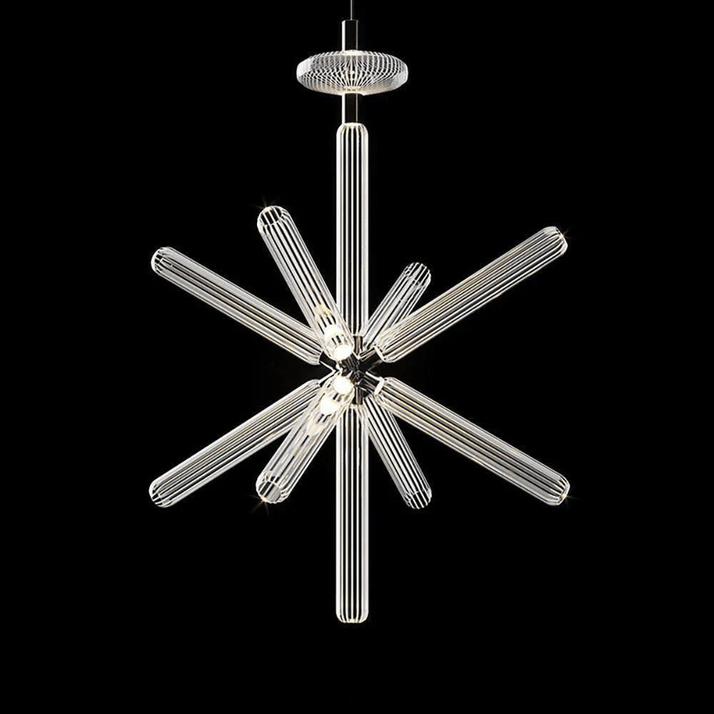 Chrome rods burst from a polished centre on this lit Clérachic pendant against black.