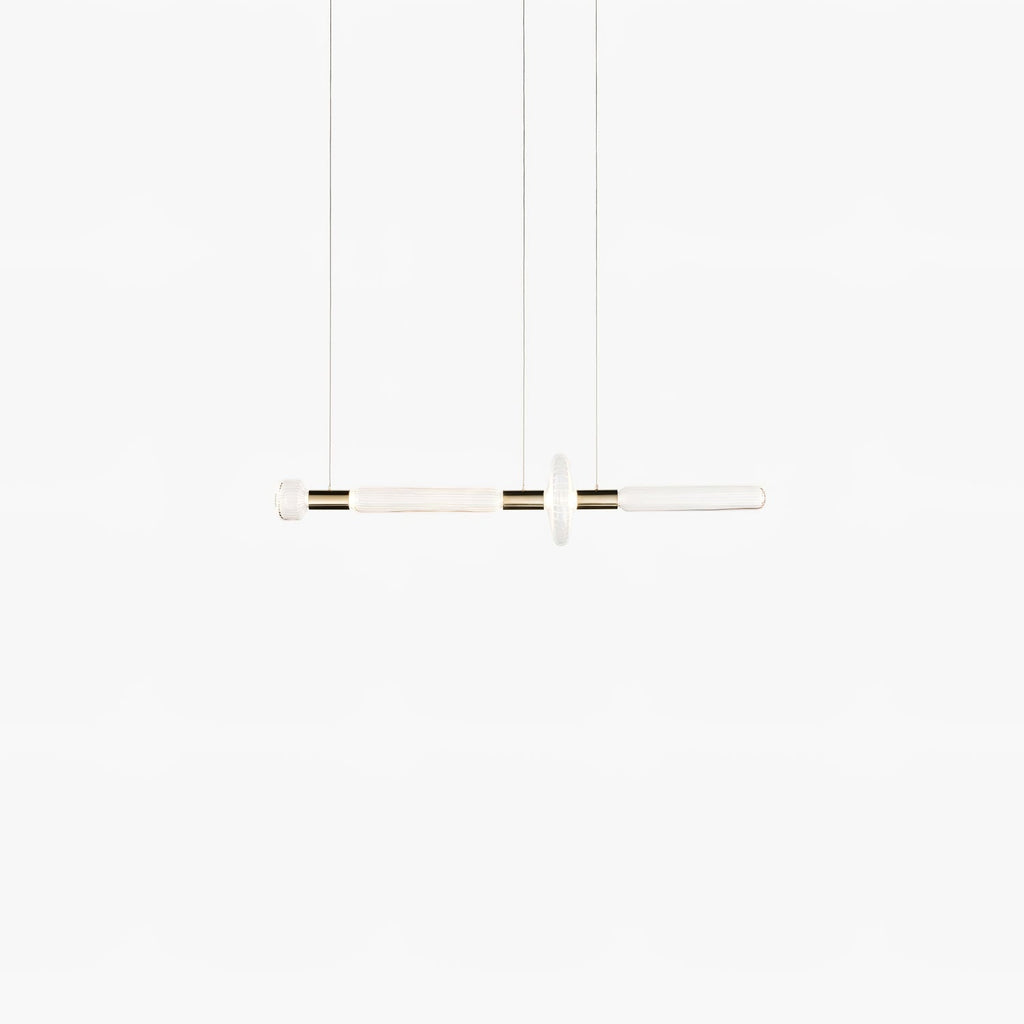 Pale and slender, this Clérachic pendant's small bar shows faintly on a light backdrop.