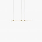 Pale and slender, this Clérachic pendant's small bar shows faintly on a light backdrop.