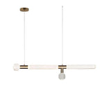 Fluted rods form this Clérachic pendant's bar, hung from a round brass ceiling plate.