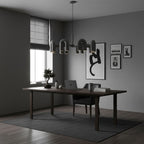 Cirkus chandelier ring of U-heads lit in a room
