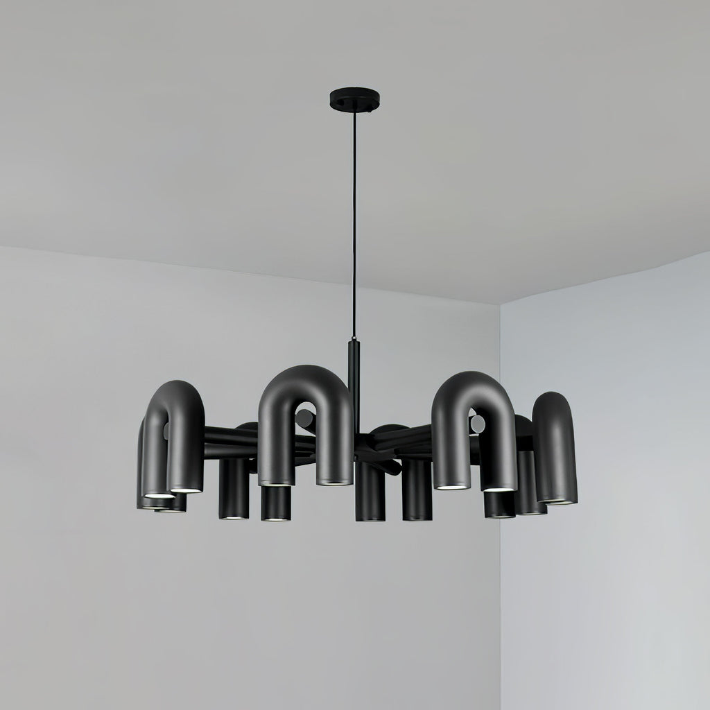 Cirkus chandelier with directional U-heads in a styled room
